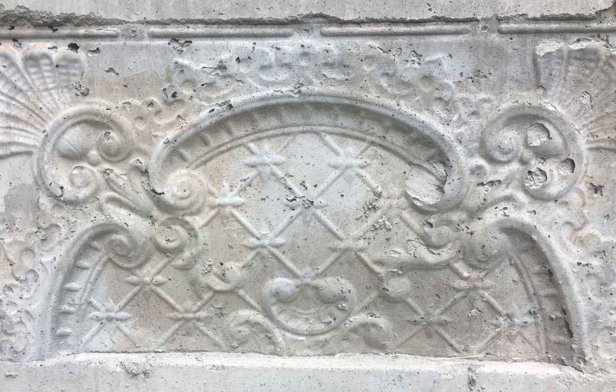Historic tin concrete imprint via